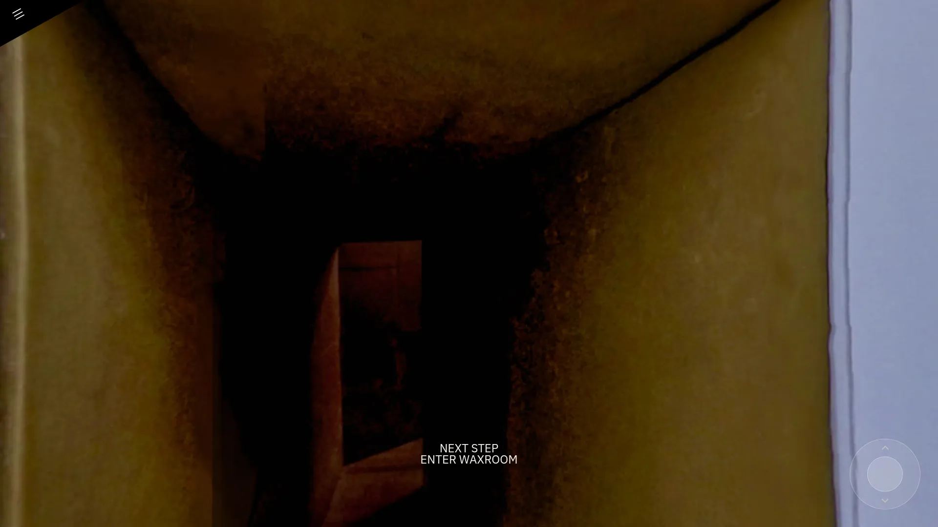The threshold of the wax chamber: ochre walls and a dark way in, with the prompt to enter the Wachsraum.
